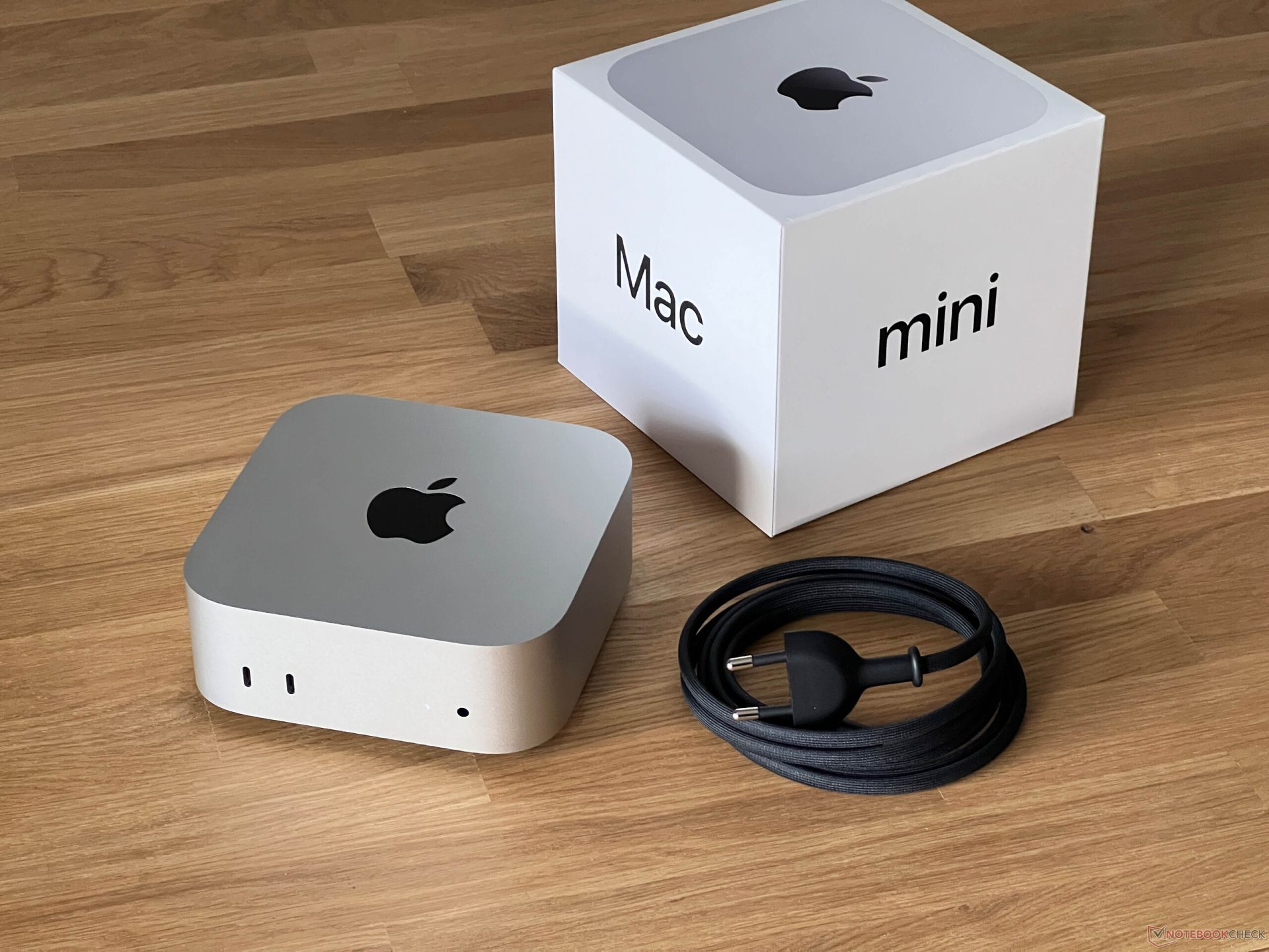 A close-up shot of an Apple Mac mini desktop computer.