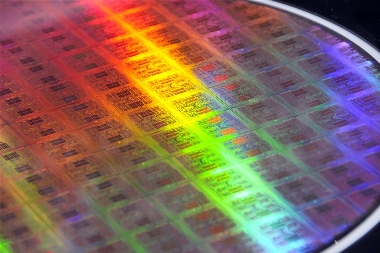 Abstract representation of microscopic semiconductor materials flowing, illustrating market growth.