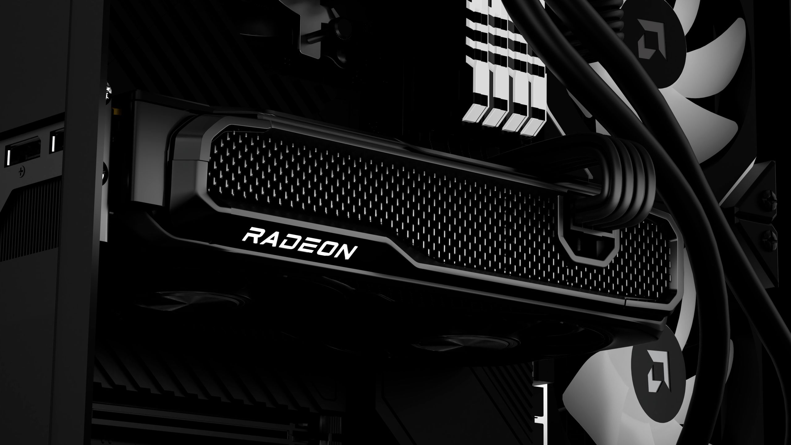 Close-up of a graphics card's cooling solution with 'AMD' logo visible.