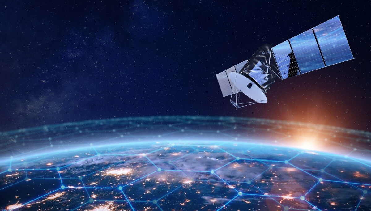 An artist's impression of a satellite in orbit transmitting a beam of light towards Earth.