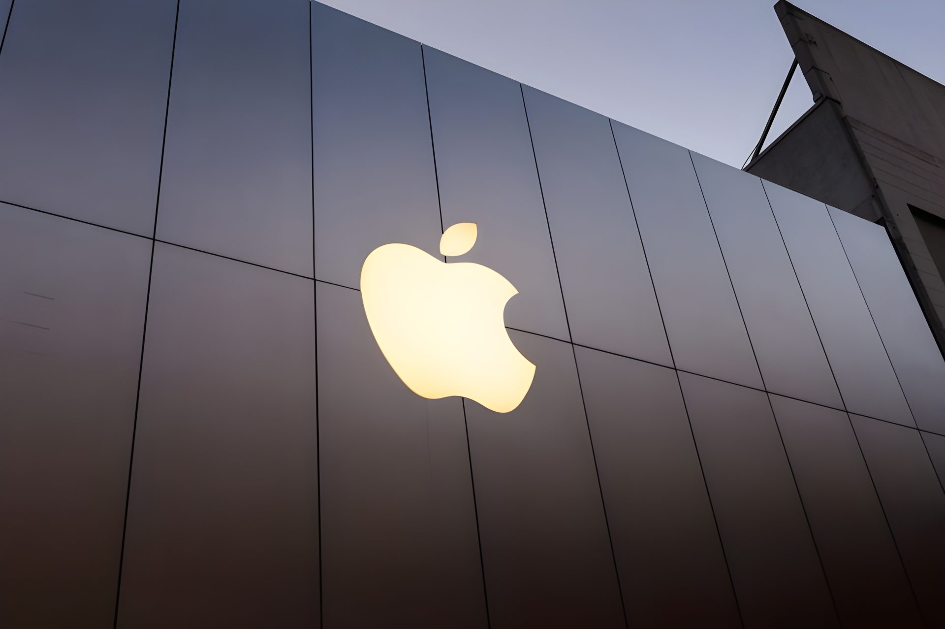 An abstract graphic representing interconnected memory chips with Apple's logo subtly integrated.