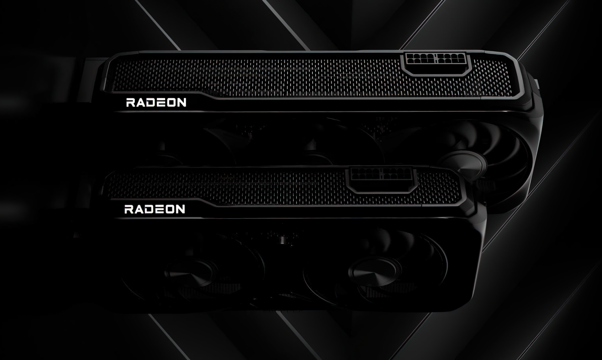 A pile of AMD Radeon graphics cards with price tags showing significantly reduced prices.