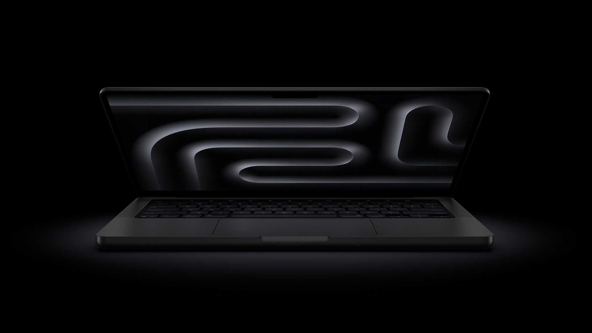 A 14-inch MacBook Pro with the M5 Pro chip displayed open on a desk with a discount sticker highlighting its price.