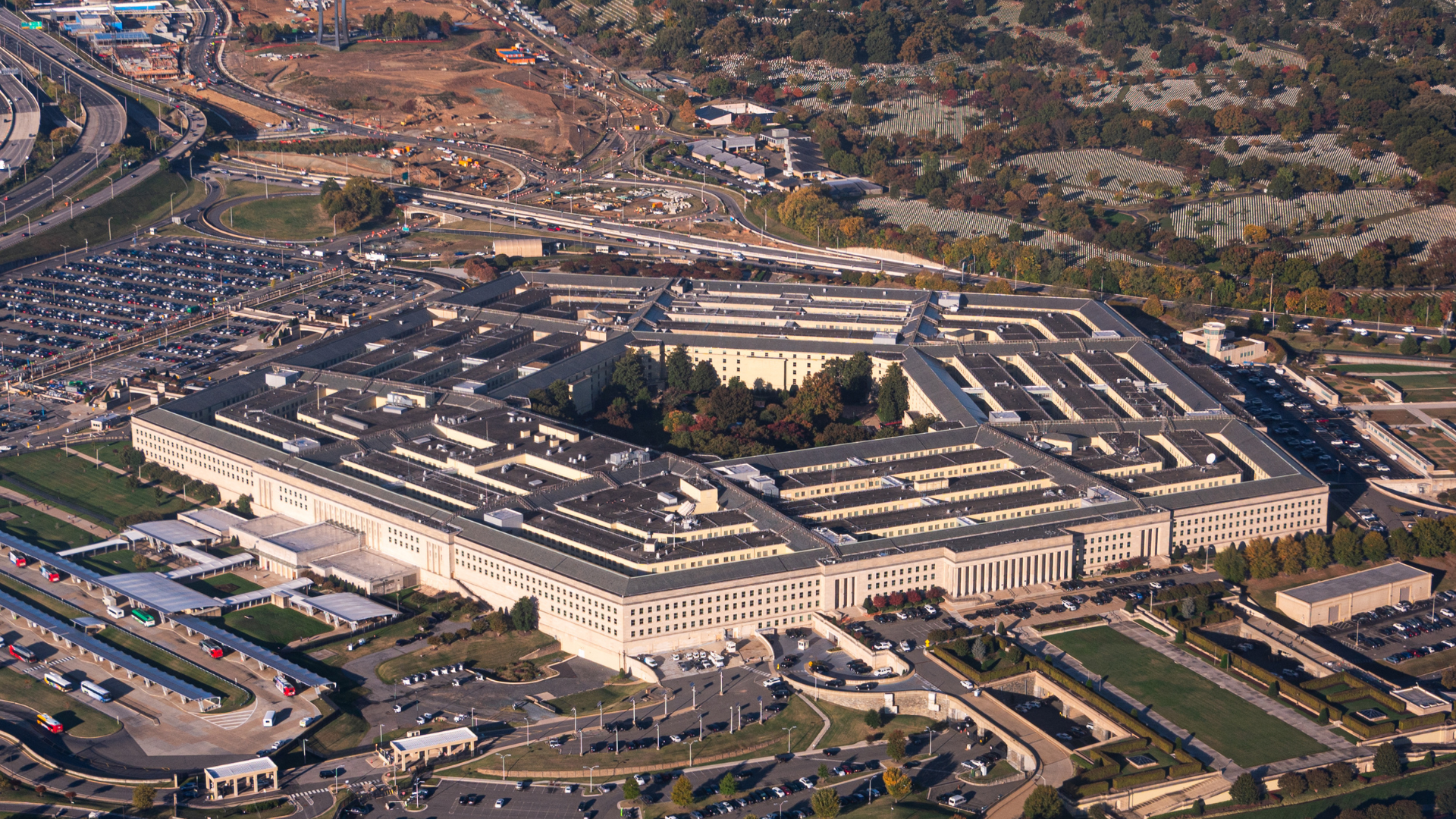A symbolic image representing data flowing into military command centers, with logos of major tech companies subtly integrated.
