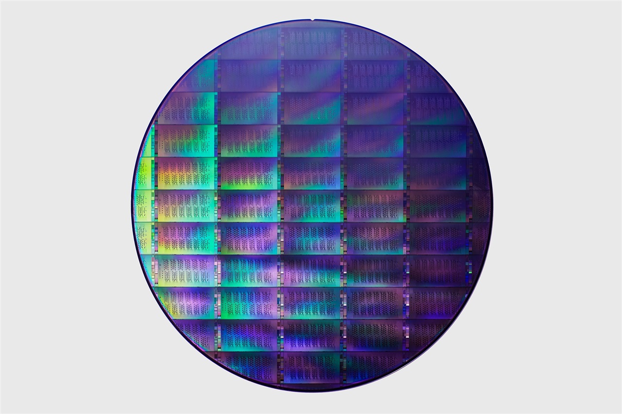 An artist's rendition of a futuristic quantum computing chip fabrication facility.