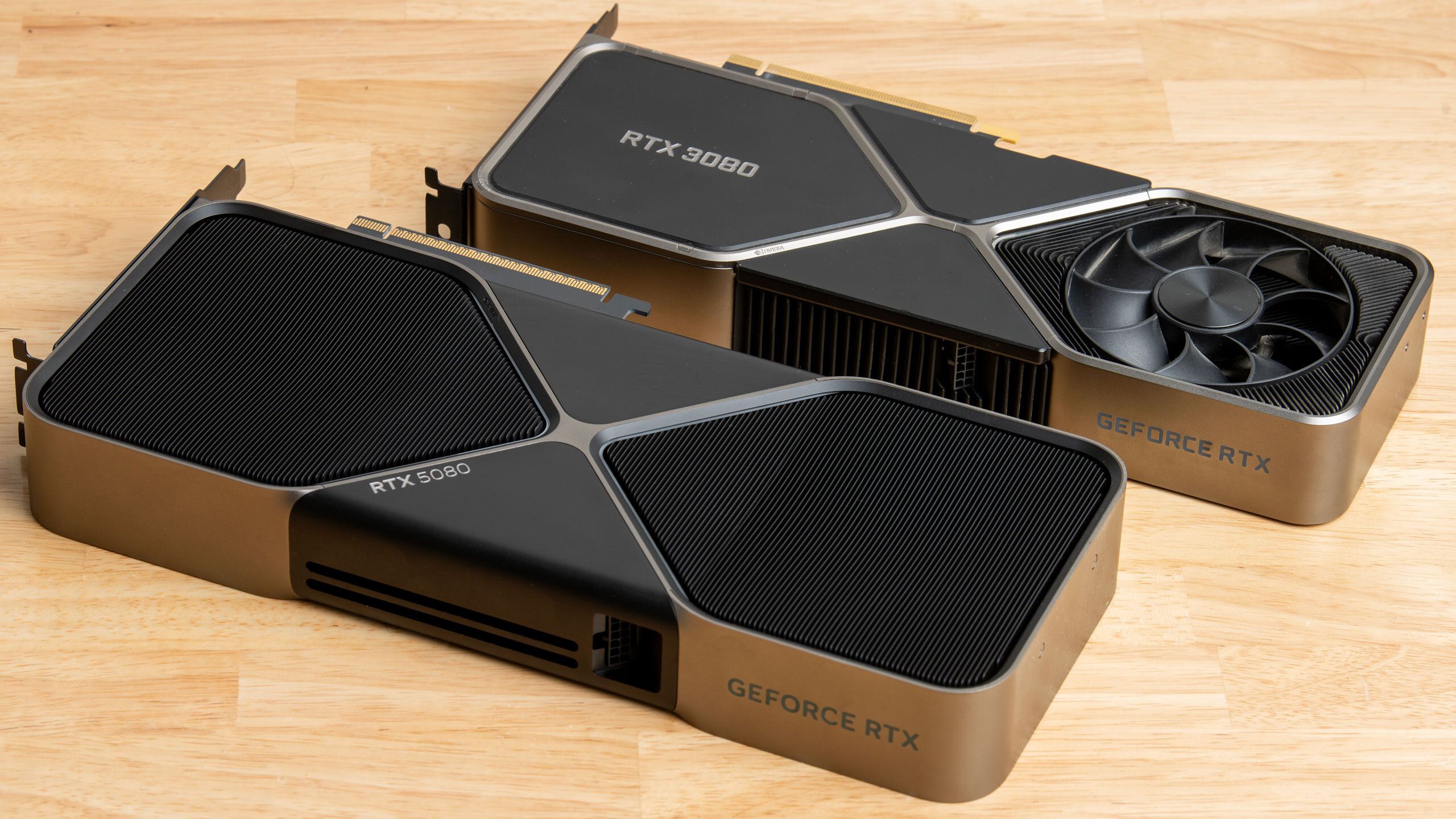 Comparison graph showing RTX 5090 single GPU vs. RTX 5090 + RTX 5060 (PhysX) performance in Batman: Arkham Asylum.