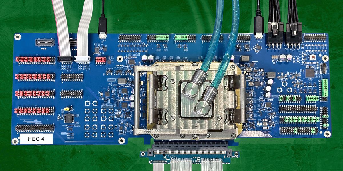 Intel Heracles chip package with HBM and liquid cooling at ISSCC demo