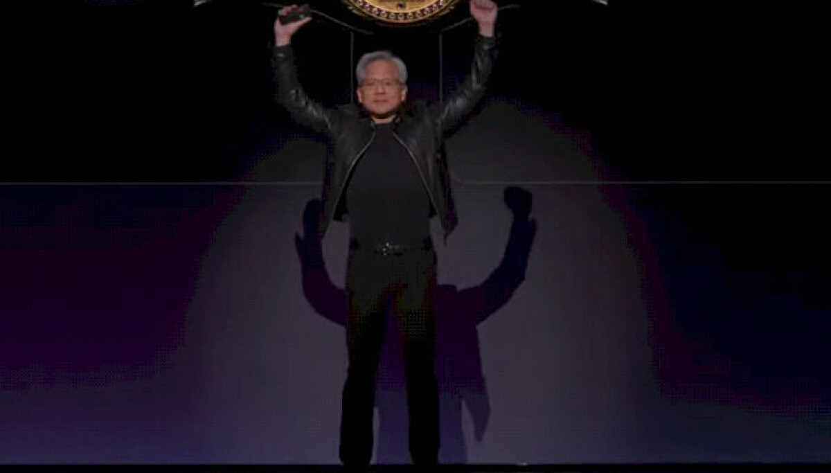 Jensen Huang at GTC 2026 stacking R200 GPU and Groq LP30 chip