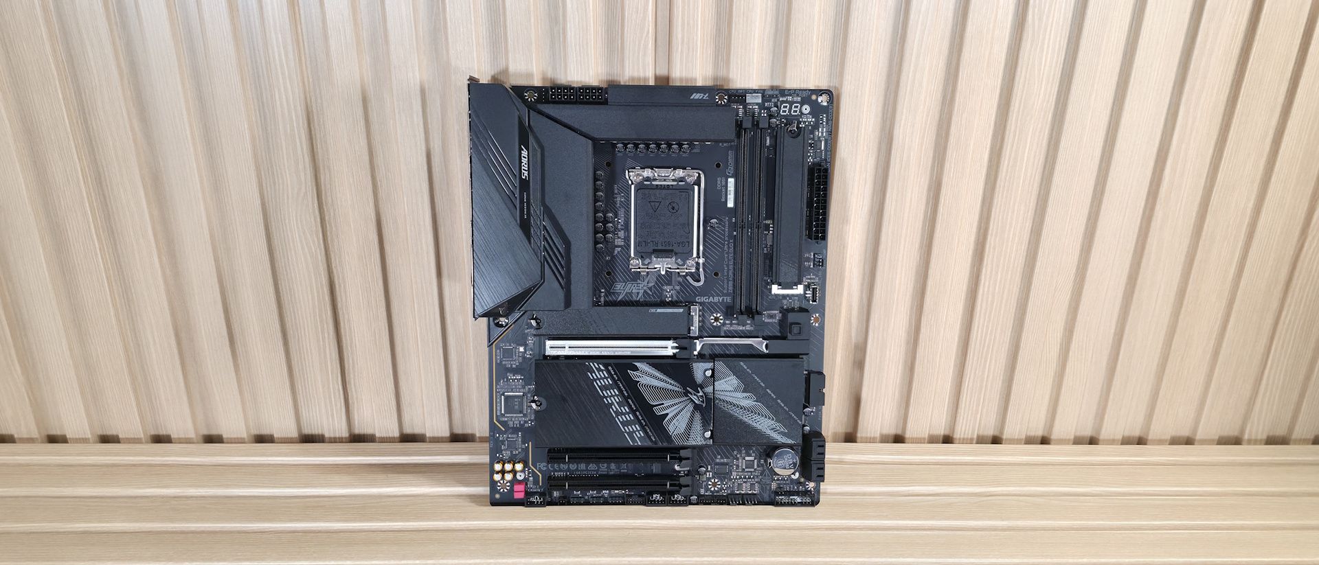 Gigabyte Z890 Aorus Elite Duo X motherboard with prominent heatsinks and RAM slots.
