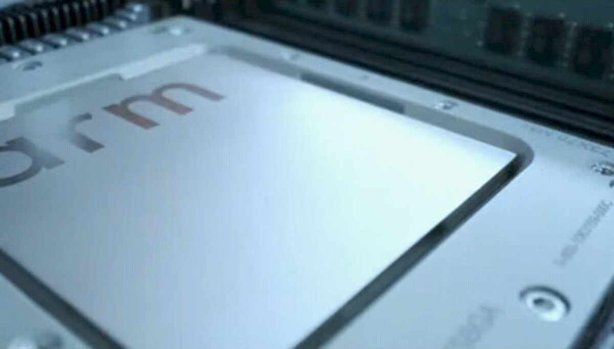 Arm CEO Rene Haas holding the first AGI server CPU silicon sample