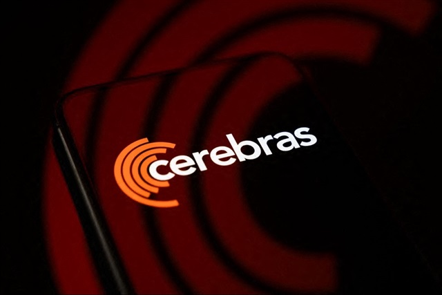 An image of a massive Cerebras Wafer Scale Engine chip, significantly larger than standard silicon wafers.