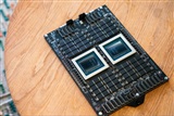 Close-up of a computer chip with complex circuitry visible