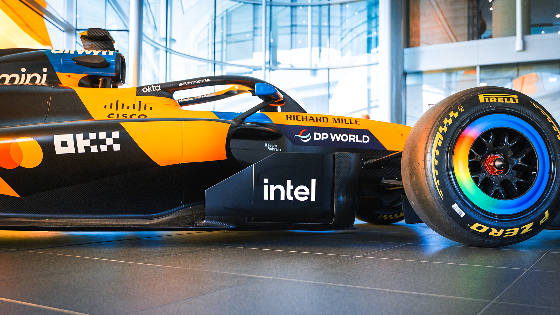 An Intel logo is placed on the side of a McLaren Formula 1 race car.