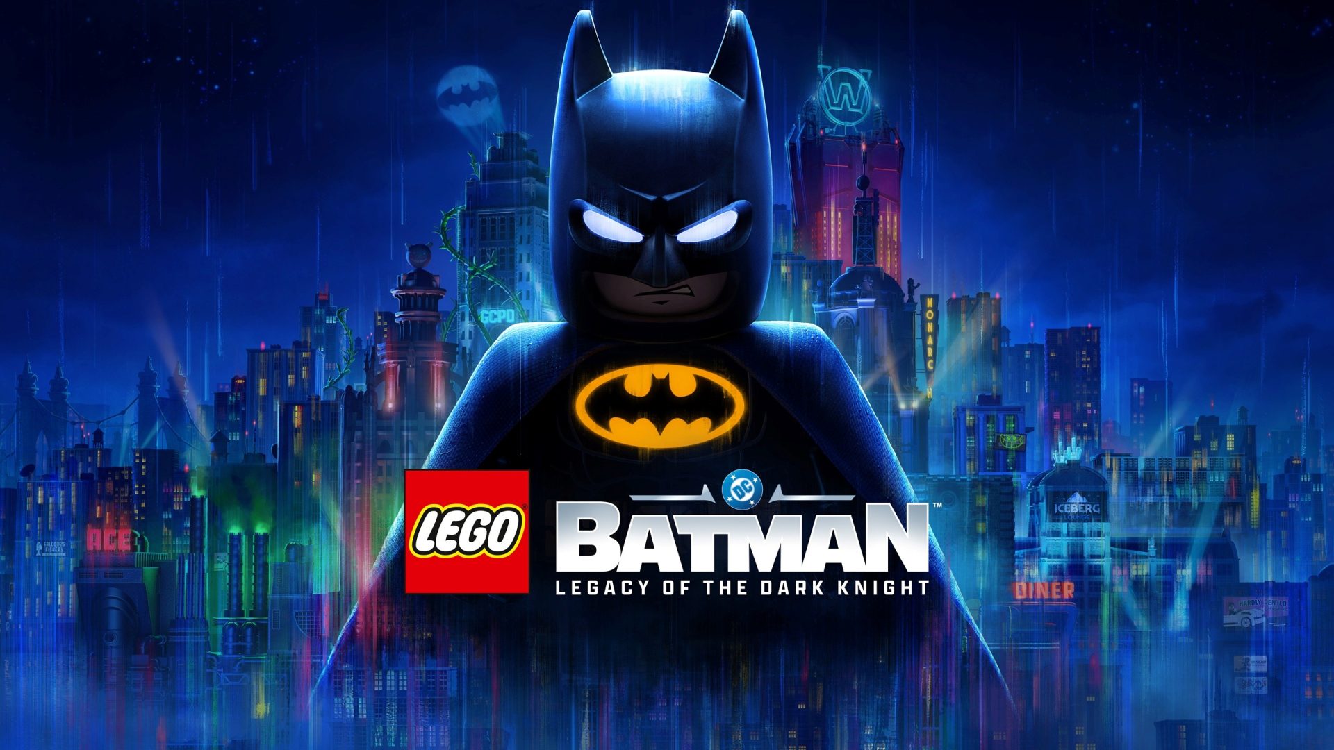 Lego Batman standing heroically in front of a brick-built Gotham City skyline at night.