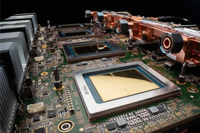 Google TPU v8t and v8i chips side by side on data center tray with liquid cooling